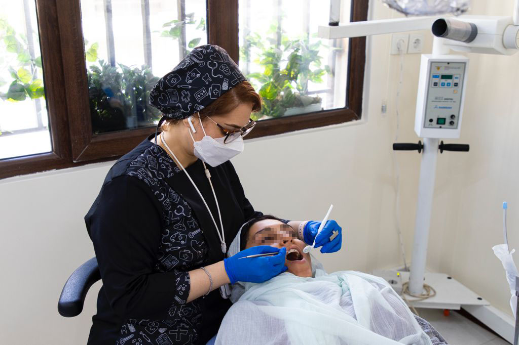 دکتر نغمه معراجی متخصص درمان ریشه تهران